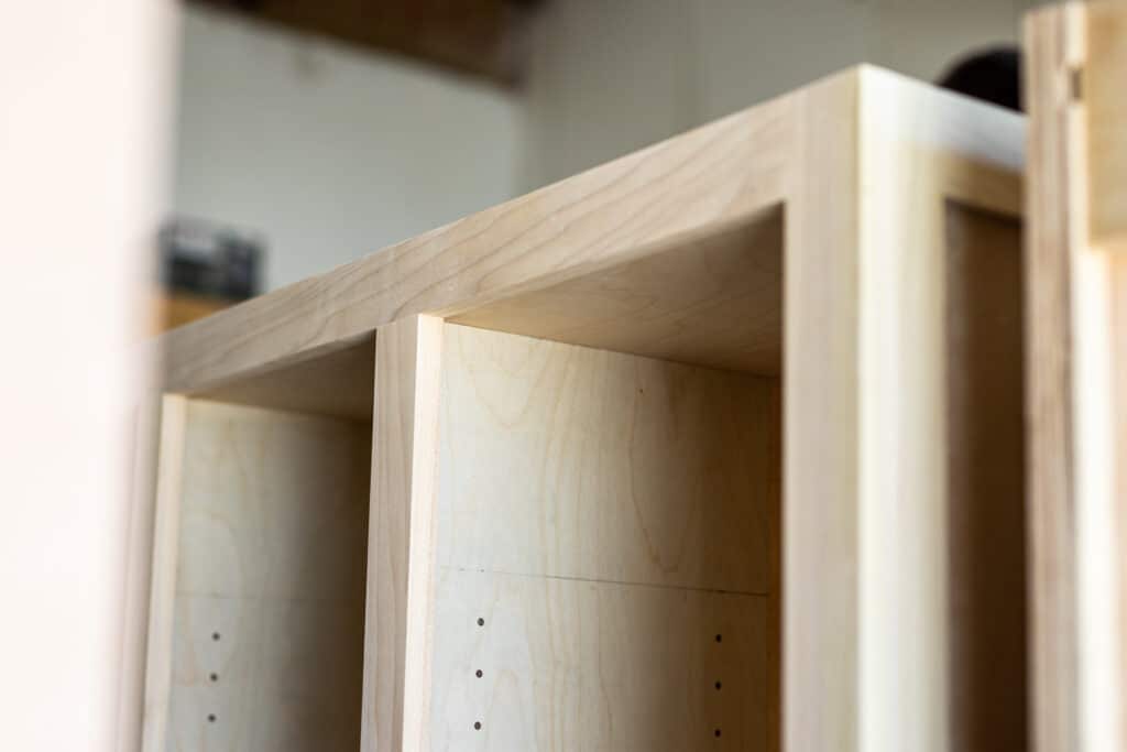 Close-up of natural-wood, custom cabinetry built at the TressCo Construction Cabinet Shop.